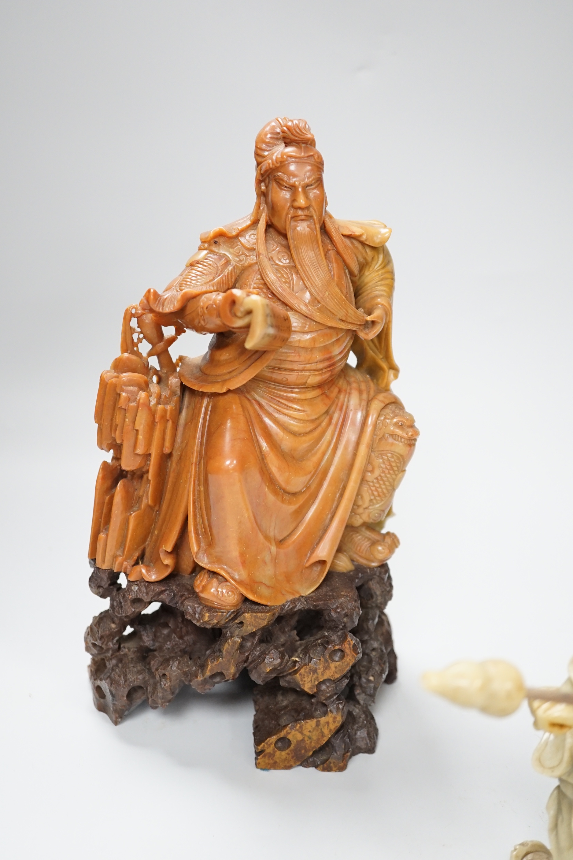 Two Chinese soapstone figures of Confucius and Guan Yu, tallest 26cm high